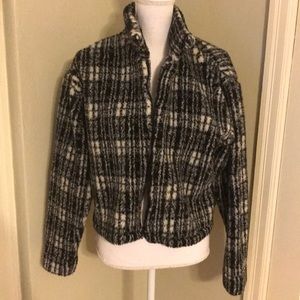 Black/White waist length jacket size medium.